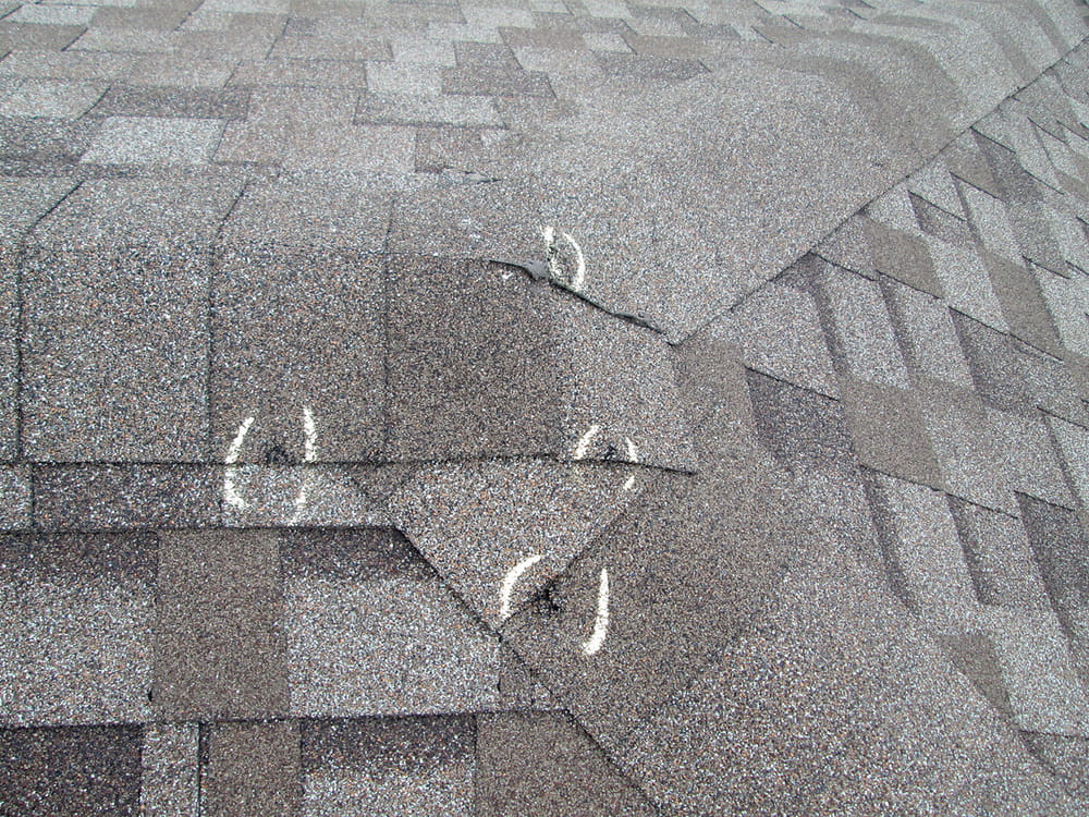 Example of hail damage on shingle roof.
