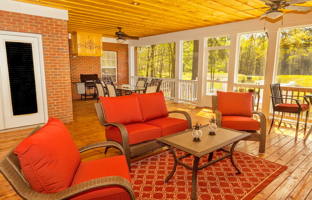 Outdoor patio furniture under wood shingles